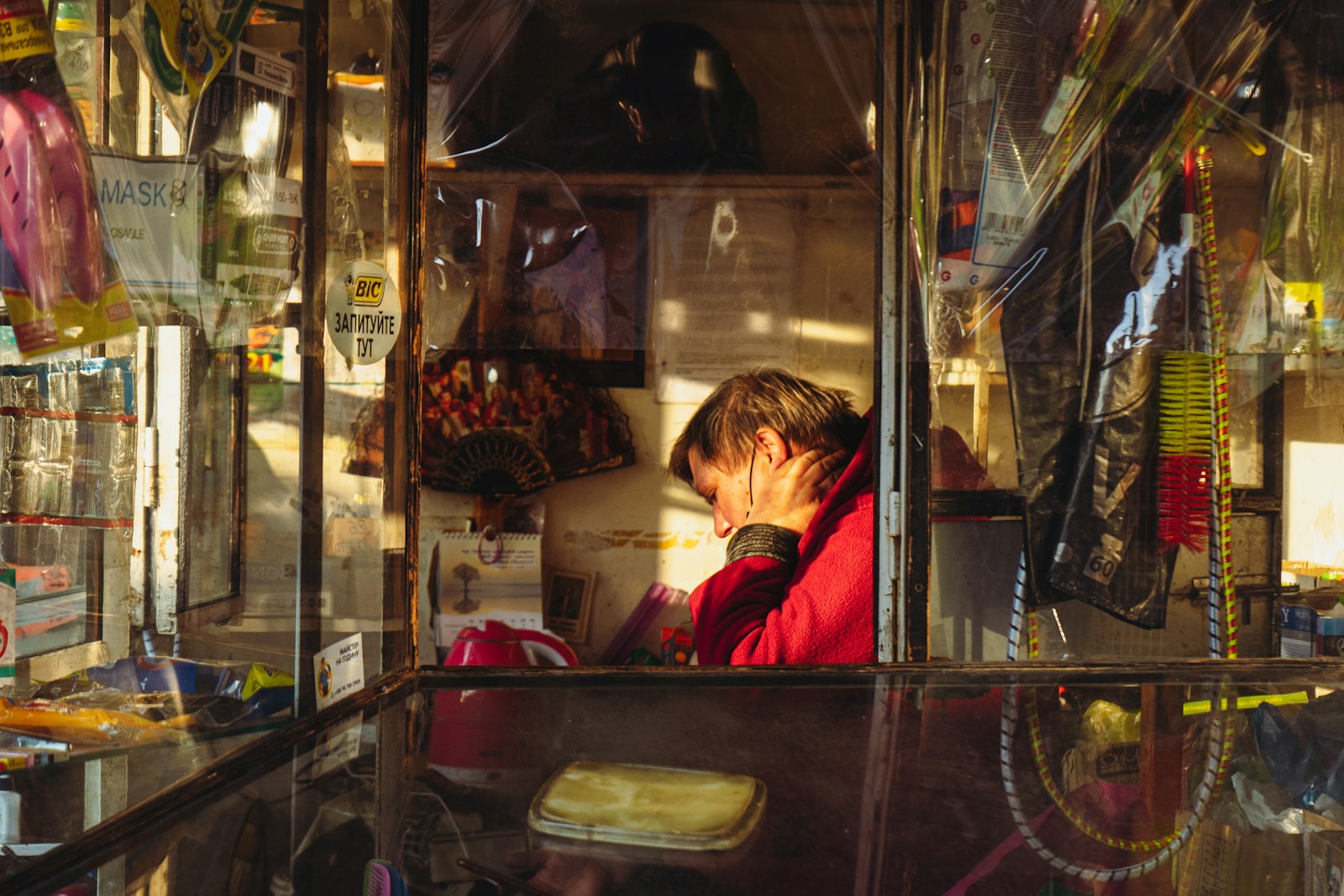 Small-business owner working from a shop counter
